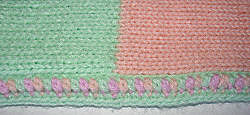 close-up of fancy border on baby blanket
