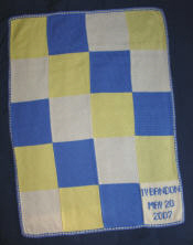 knitted baby blanket, yellow blue and white