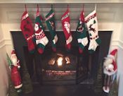 6 stockings at fireplace