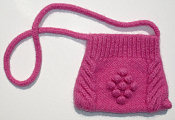 felted pink bag with bobbles and cables