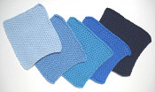 knitted dishcloths in shades of blue
