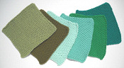 knitted dishcloths in shades of green