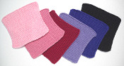 knitted dishcloths in pinks, reds, purples, black