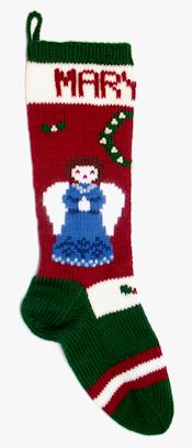 side view of stocking with angels, wreath, and holly