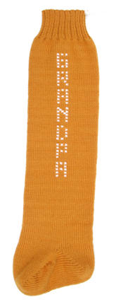 gold stocking with cross-stitch name