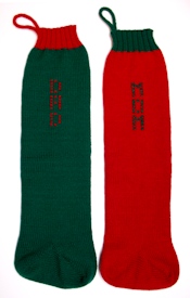 red and green stockings with cross-stitch names