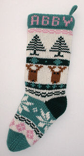 stylized reindeer faces on stocking