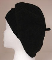 knitted beret, pulled back